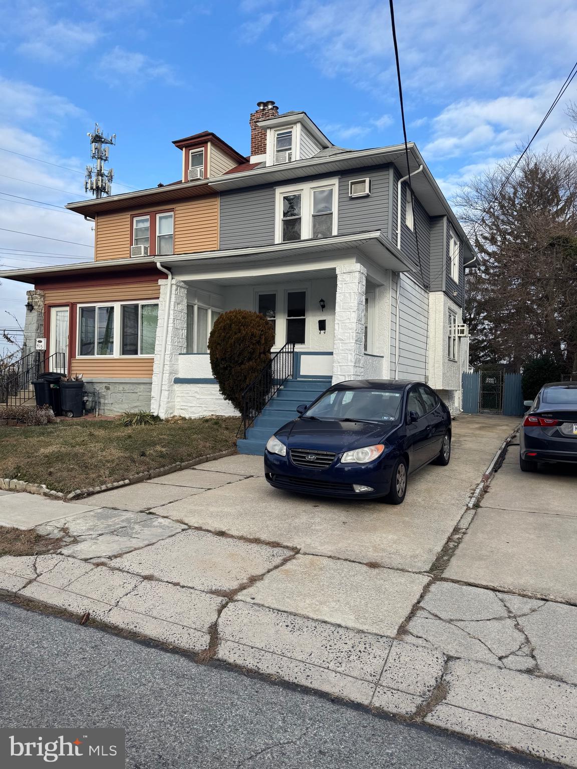 a car parked in front of a house