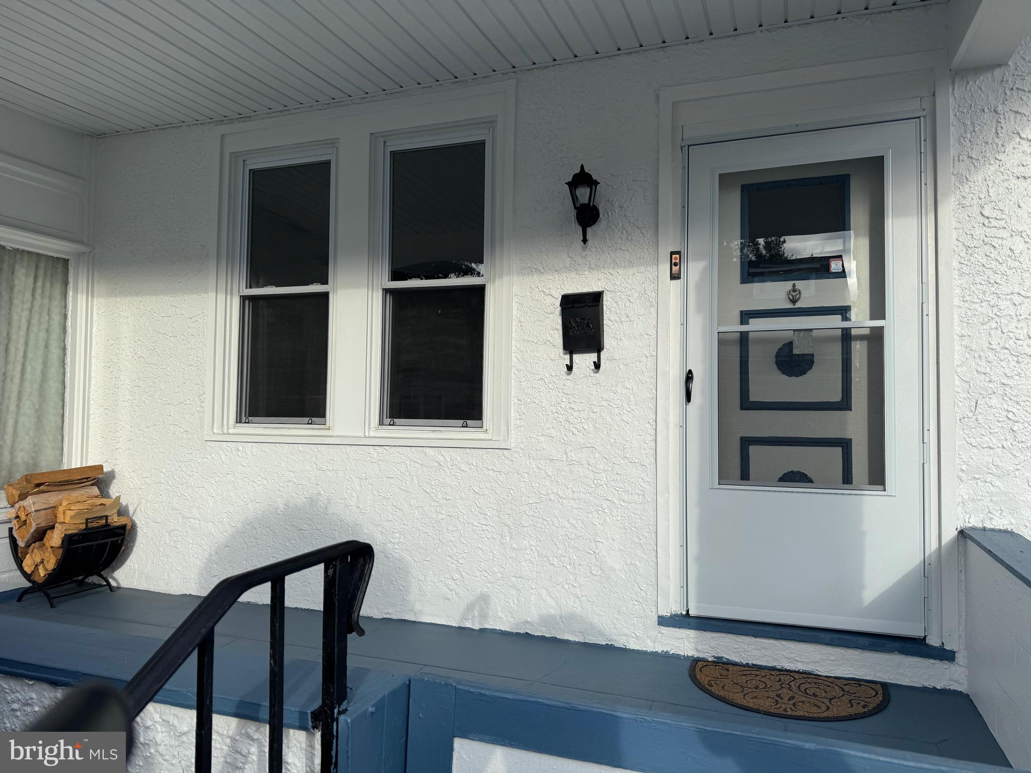 417 Laurel Road Lansdowne, PA 19050 - Photo 3 of 22 a view of a livingroom with furniture and wooden floor