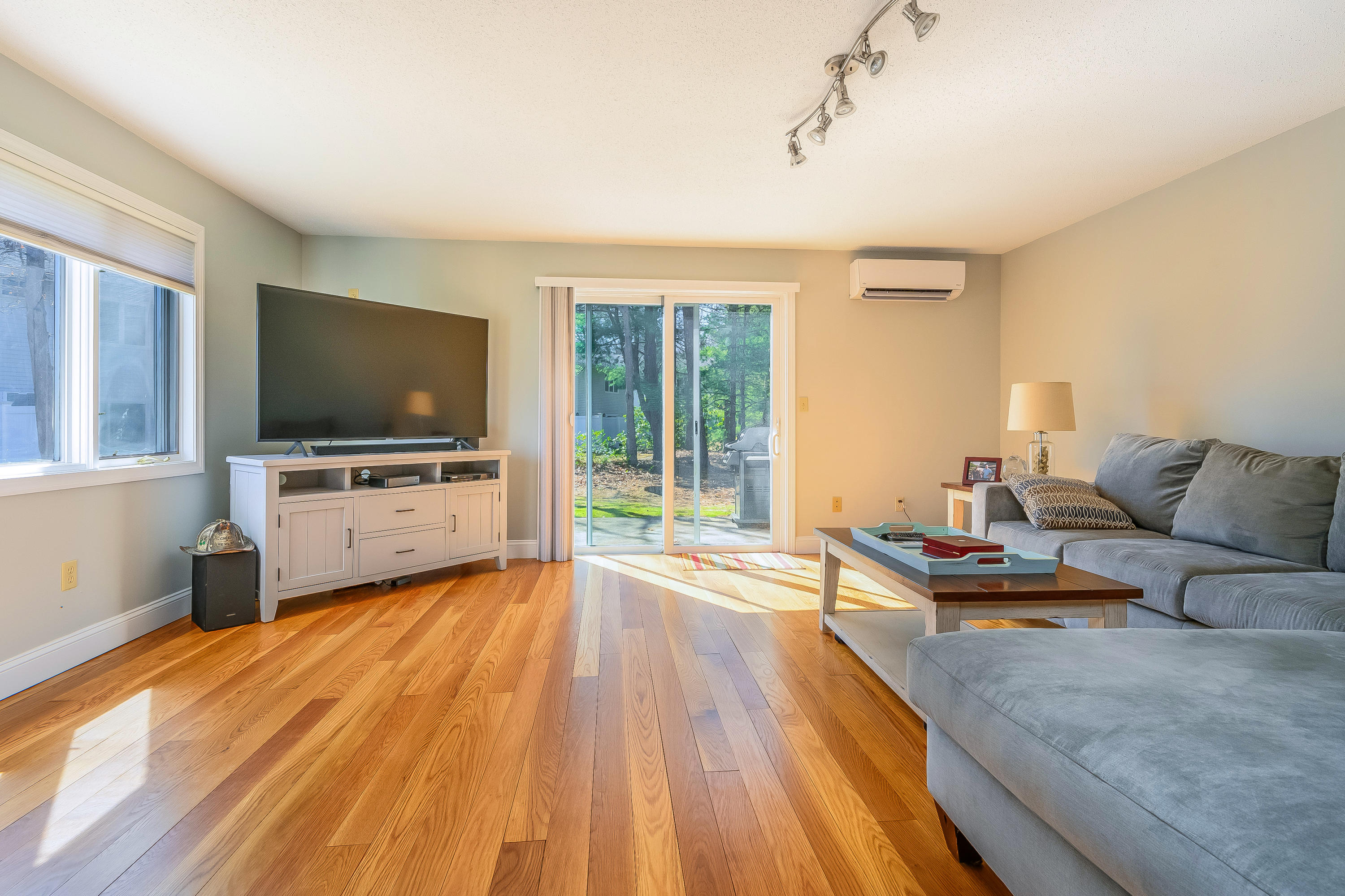 174 Lowell Road, Unit D37 Mashpee, MA 02649 - Photo 3 of 19 a living room with furniture and a flat screen tv