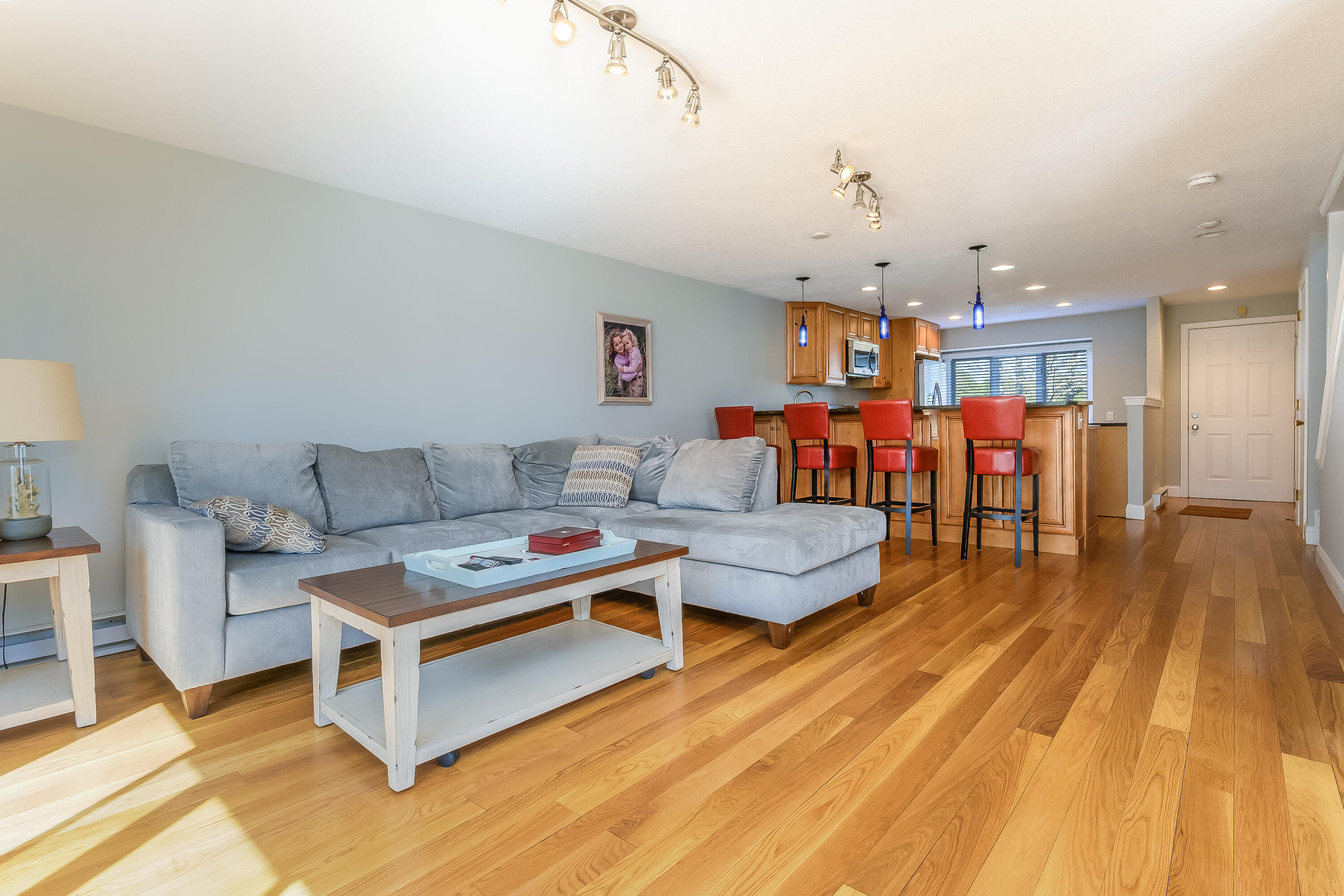 174 Lowell Road, Unit D37 Mashpee, MA 02649 - Photo 5 of 19 a living room with furniture and wooden floor