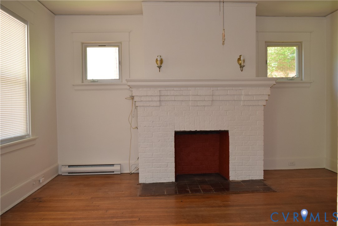301 West 30th Street Richmond, VA 23225 - Photo 2 of 15 Detailed view of wood finished floors, a brick fir