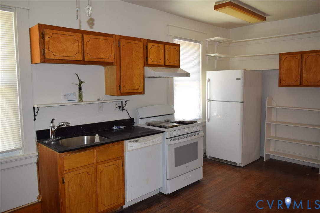 301 West 30th Street Richmond, VA 23225 - Photo 7 of 15 Kitchen with brown cabinetry, white appliances, da