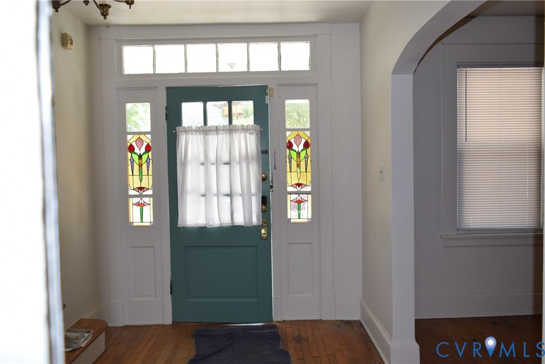 301 West 30th Street Richmond, VA 23225 - Photo 8 of 15 Doorway to outside featuring arched walkways, wood