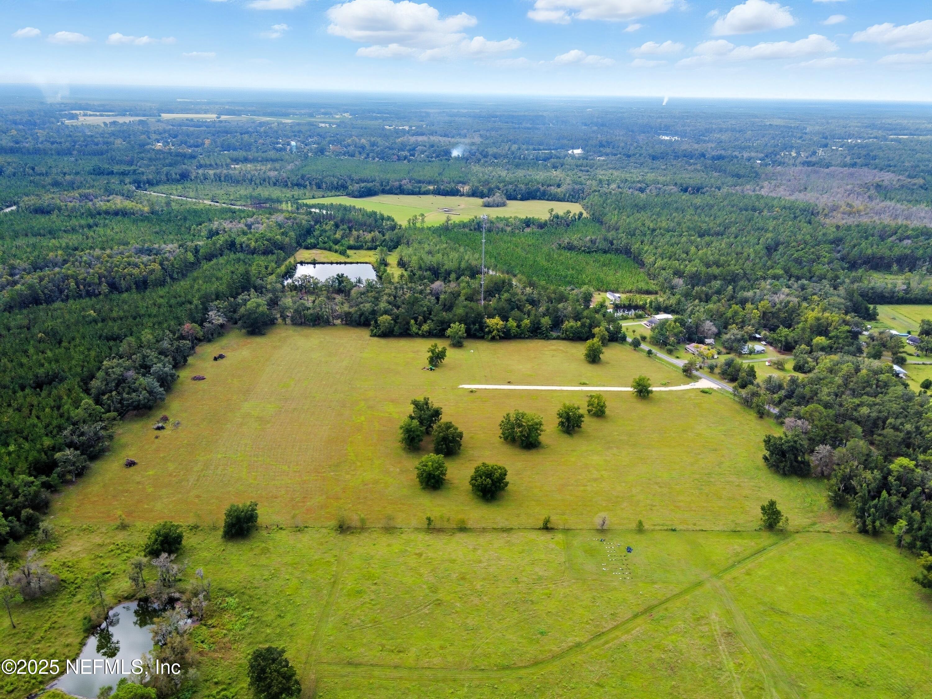 11242 Hogan Road Live Oak, FL 32060 - Photo 18 of 39 a view of a swimming pool
