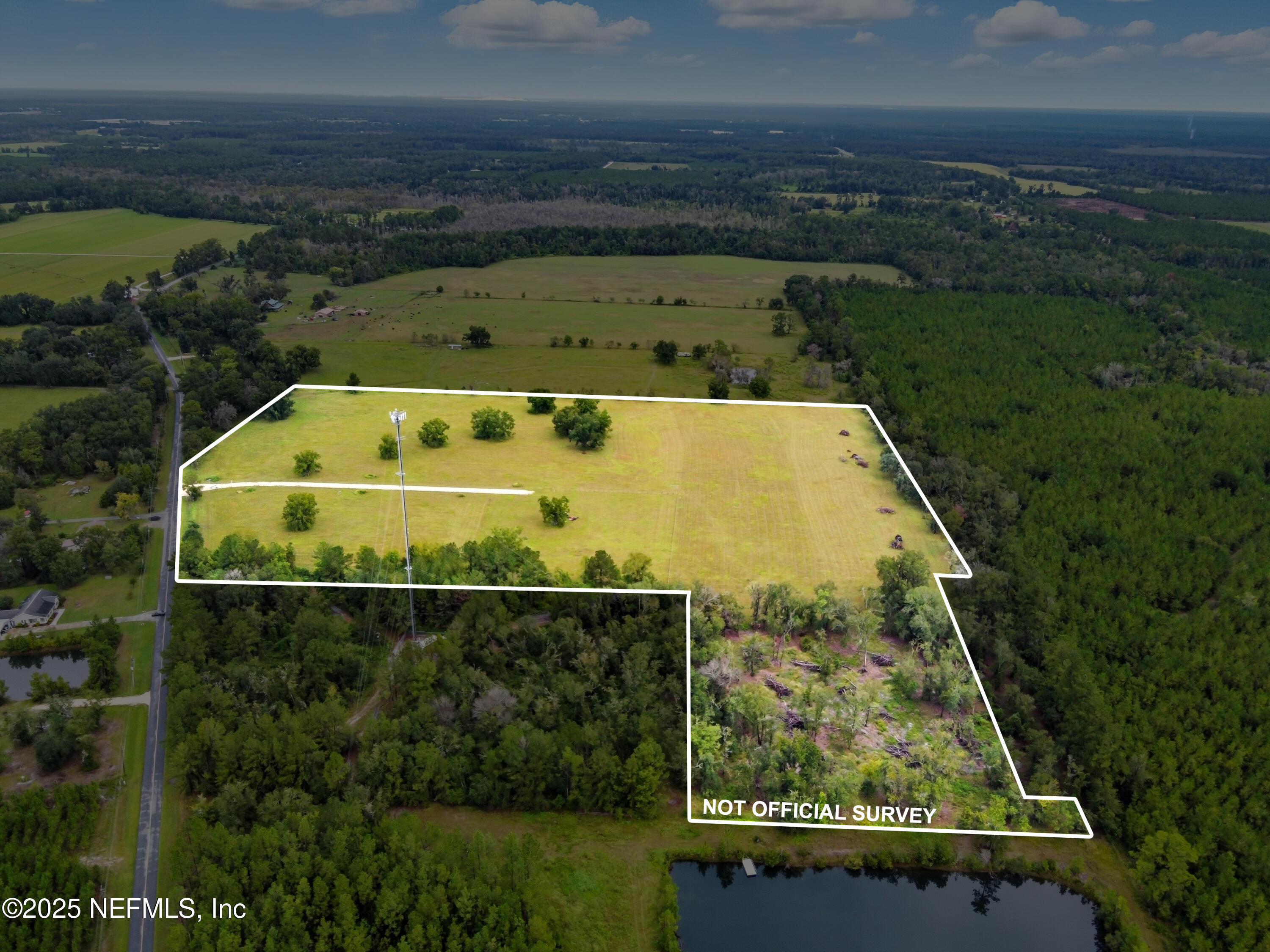 11242 Hogan Road Live Oak, FL 32060 - Photo 3 of 39 an aerial view of house with yard swimming pool and outdoor seating