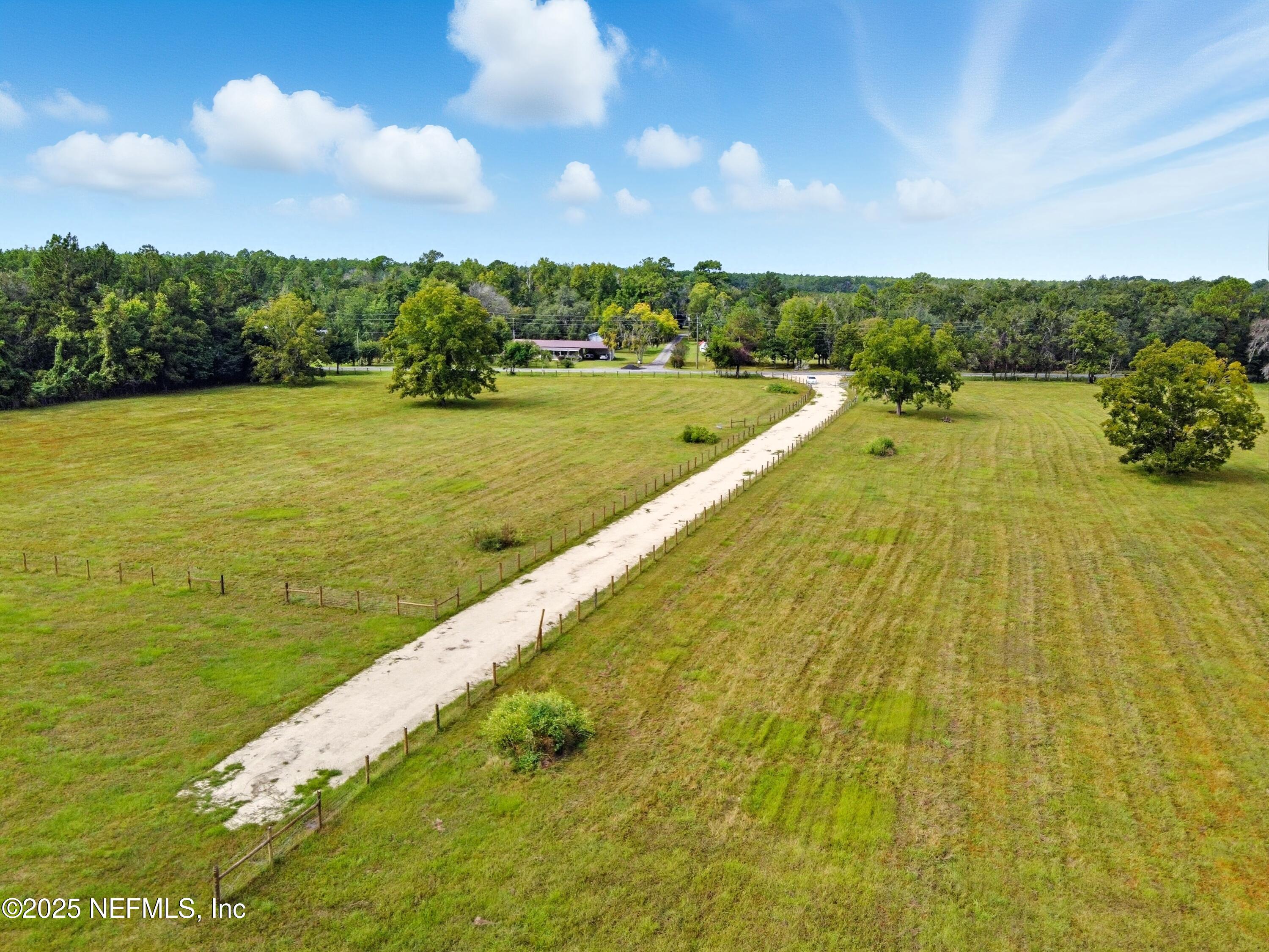 11242 Hogan Road Live Oak, FL 32060 - Photo 36 of 39 a view of an outdoor space and swimming pool