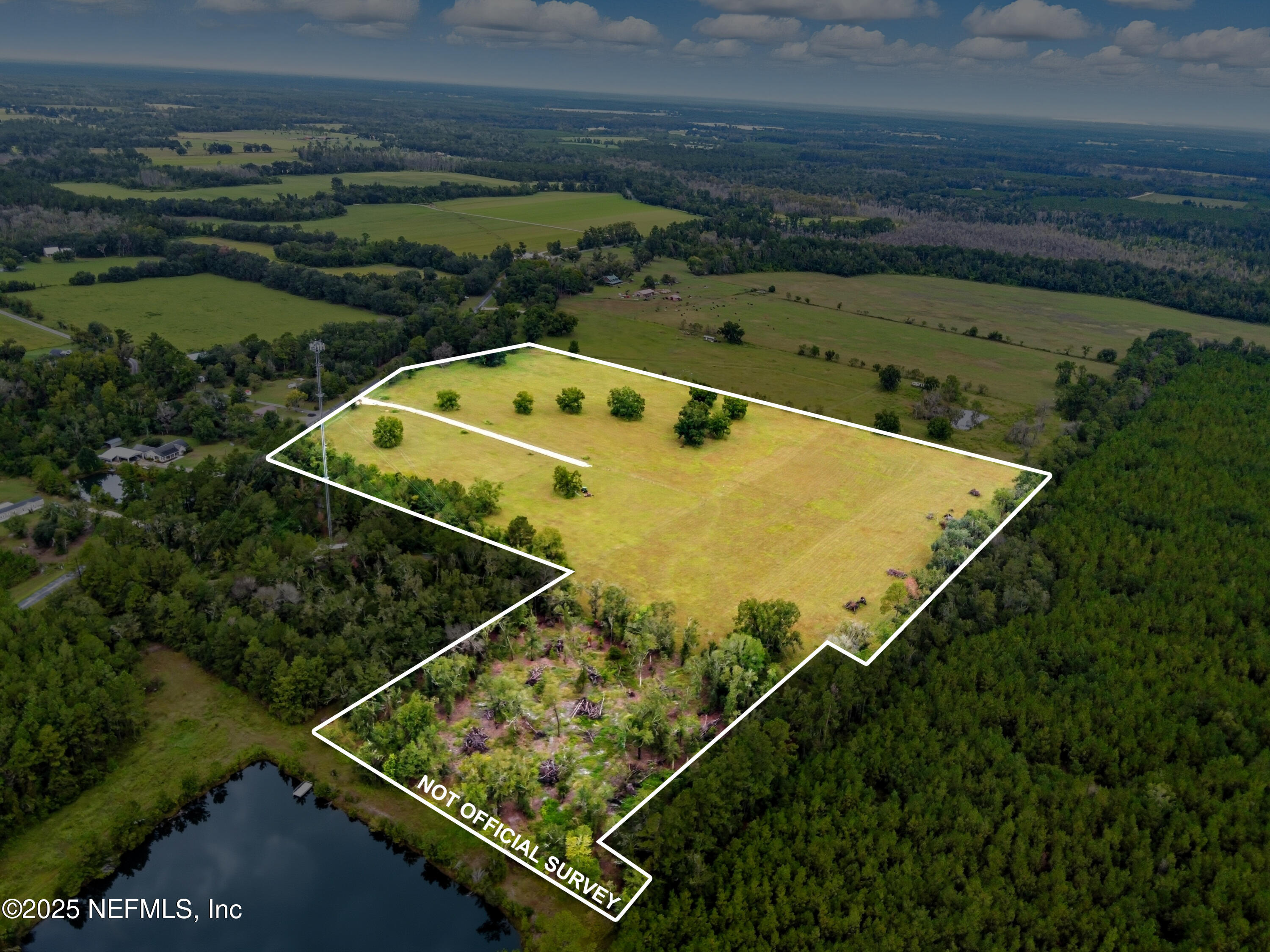 11242 Hogan Road Live Oak, FL 32060 - Photo 7 of 39 an aerial view of a pool table and chairs