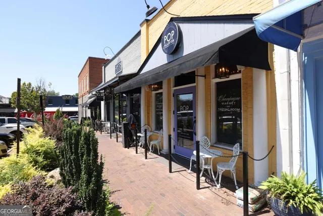 a view of a park with large trees