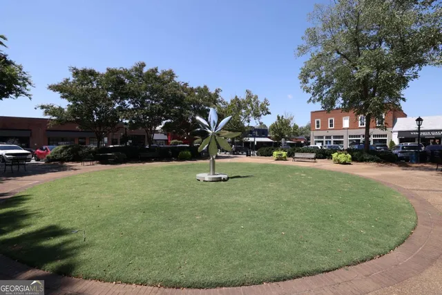 a view of a street with cars