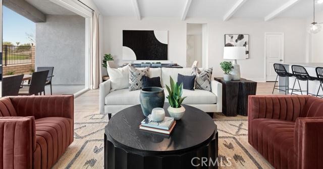 42409 Lamporo Way Indio, CA 92203 - Photo 4 of 24 a living room with furniture fireplace and a flat screen tv