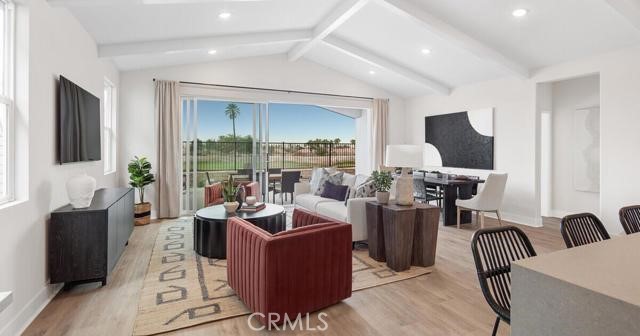 42409 Lamporo Way Indio, CA 92203 - Photo 5 of 24 a living room with furniture potted plant and a large window