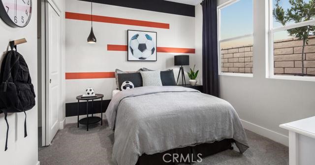 42409 Lamporo Way Indio, CA 92203 - Photo 10 of 24 a bed room with a bed and a chair