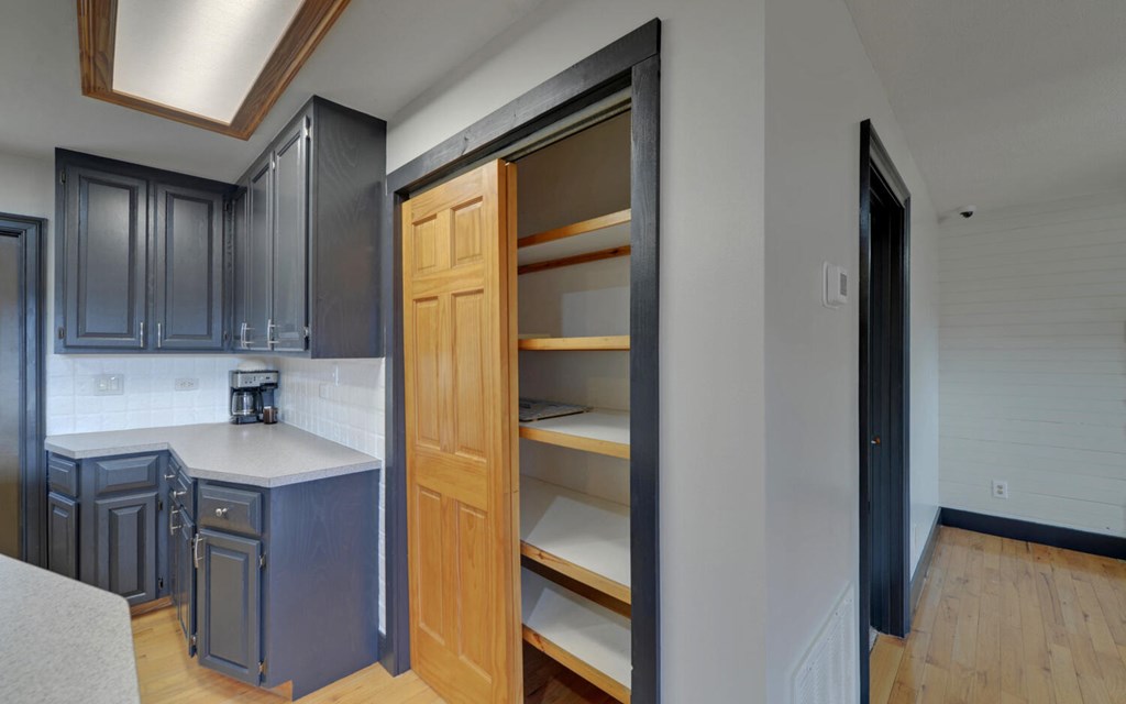16 Bell Lane Morganton, GA 30560 - Photo 15 of 51 a kitchen with a sink and a refrigerator