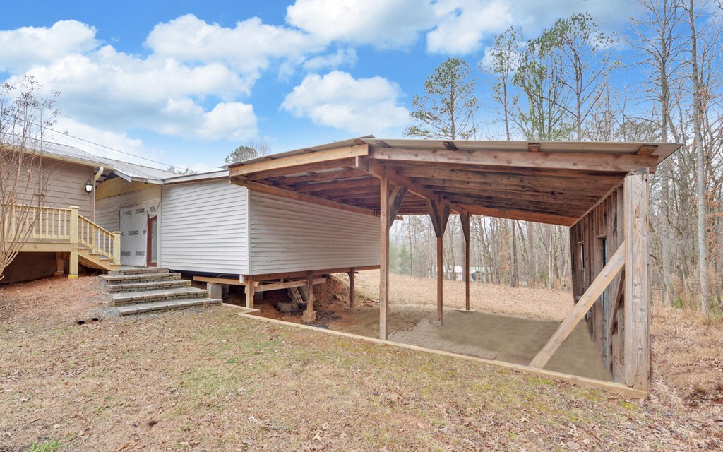 16 Bell Lane Morganton, GA 30560 - Photo 31 of 51 a view of house with backyard and barbeque oven