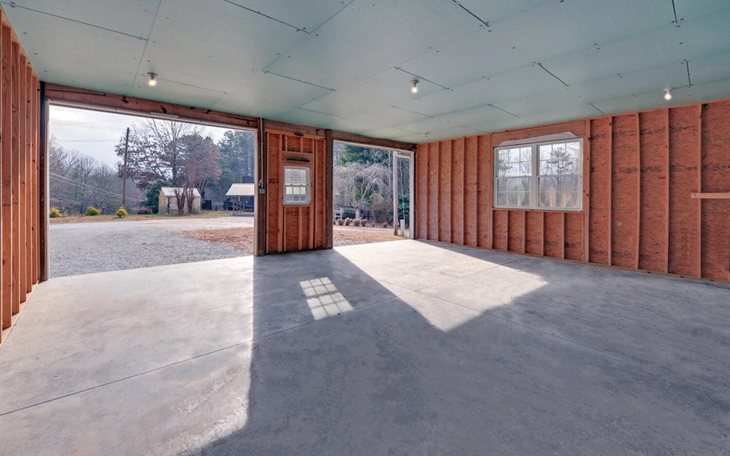 16 Bell Lane Morganton, GA 30560 - Photo 34 of 51 a view of an empty room with wooden floor and a window