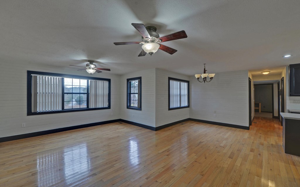 16 Bell Lane Morganton, GA 30560 - Photo 8 of 51 a view of an empty room with window and wooden floor