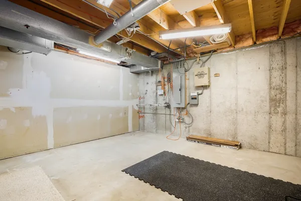 a view of a room with wooden walls