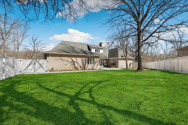 a view of yard with tree s