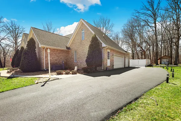 a view of a house with a big yard
