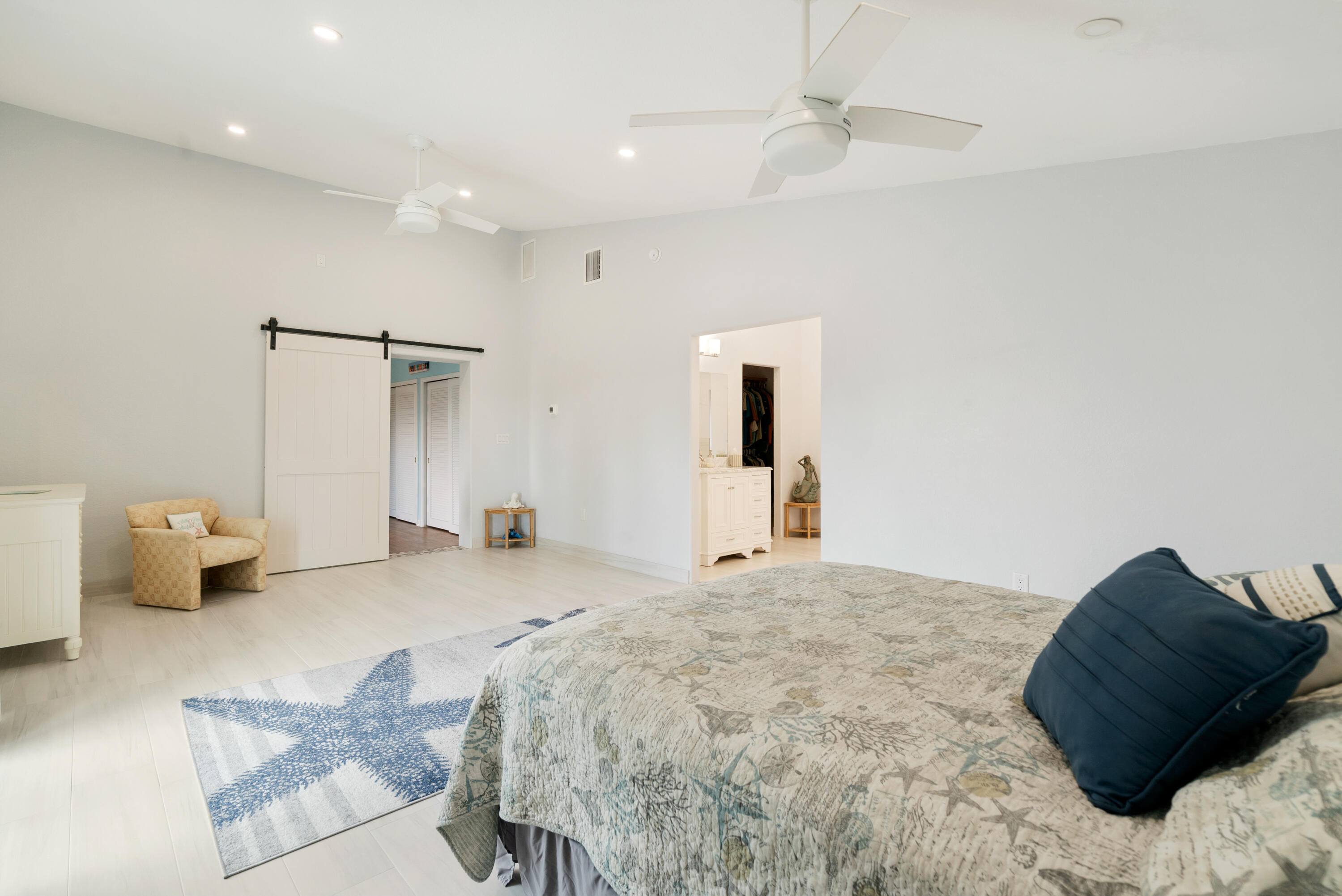 1210 Cactus Street Key Largo, FL 33037 - Photo 20 of 41 a bedroom with a bed and a couch