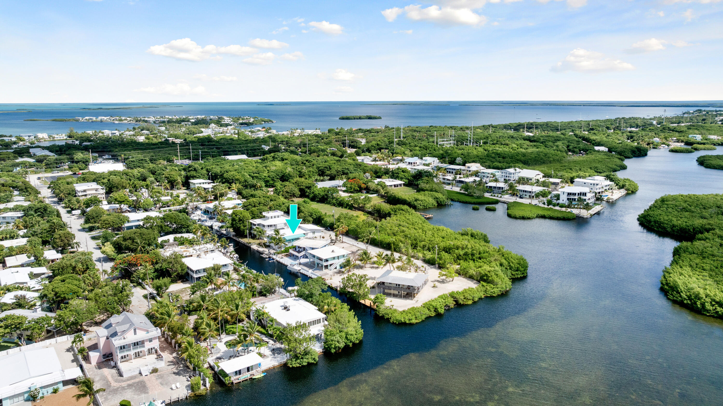 1210 Cactus Street Key Largo, FL 33037 - Photo 2 of 41 an aerial view of a houses with a garden