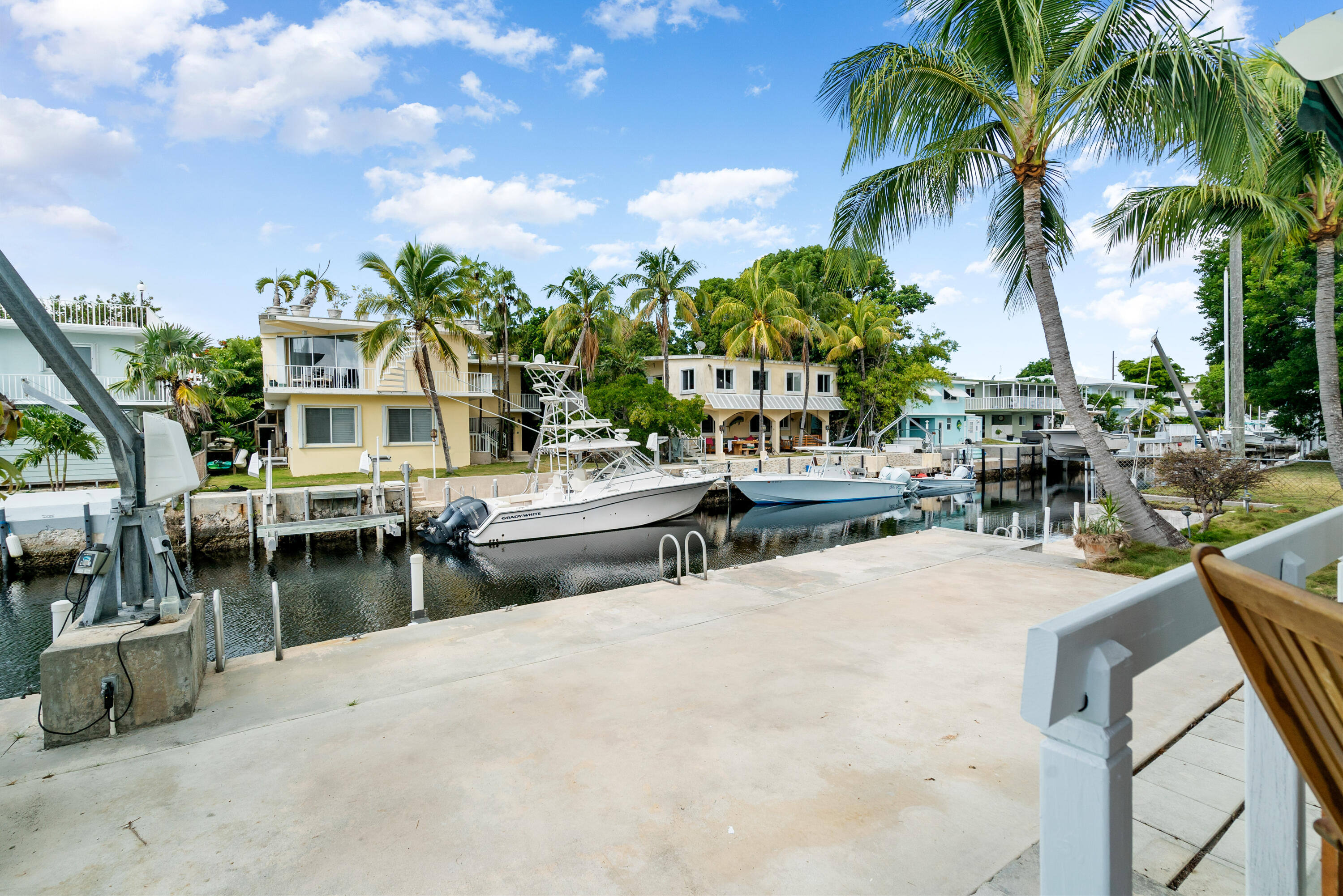1210 Cactus Street Key Largo, FL 33037 - Photo 3 of 41 a view of swimming pool with outdoor seating and plants