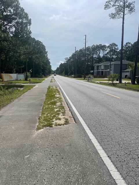 Lot 10 Churchill Bayou Road Santa Rosa Beach, FL 32459 - Photo 4 of 11 a view of a road with a yard
