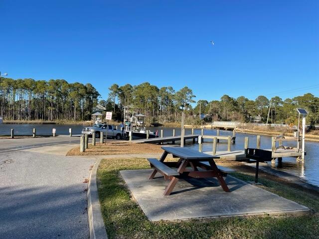 Lot 10 Churchill Bayou Road Santa Rosa Beach, FL 32459 - Photo 8 of 11 a view of a swimming pool with chairs