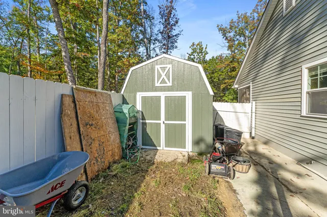 a view of a park with large trees