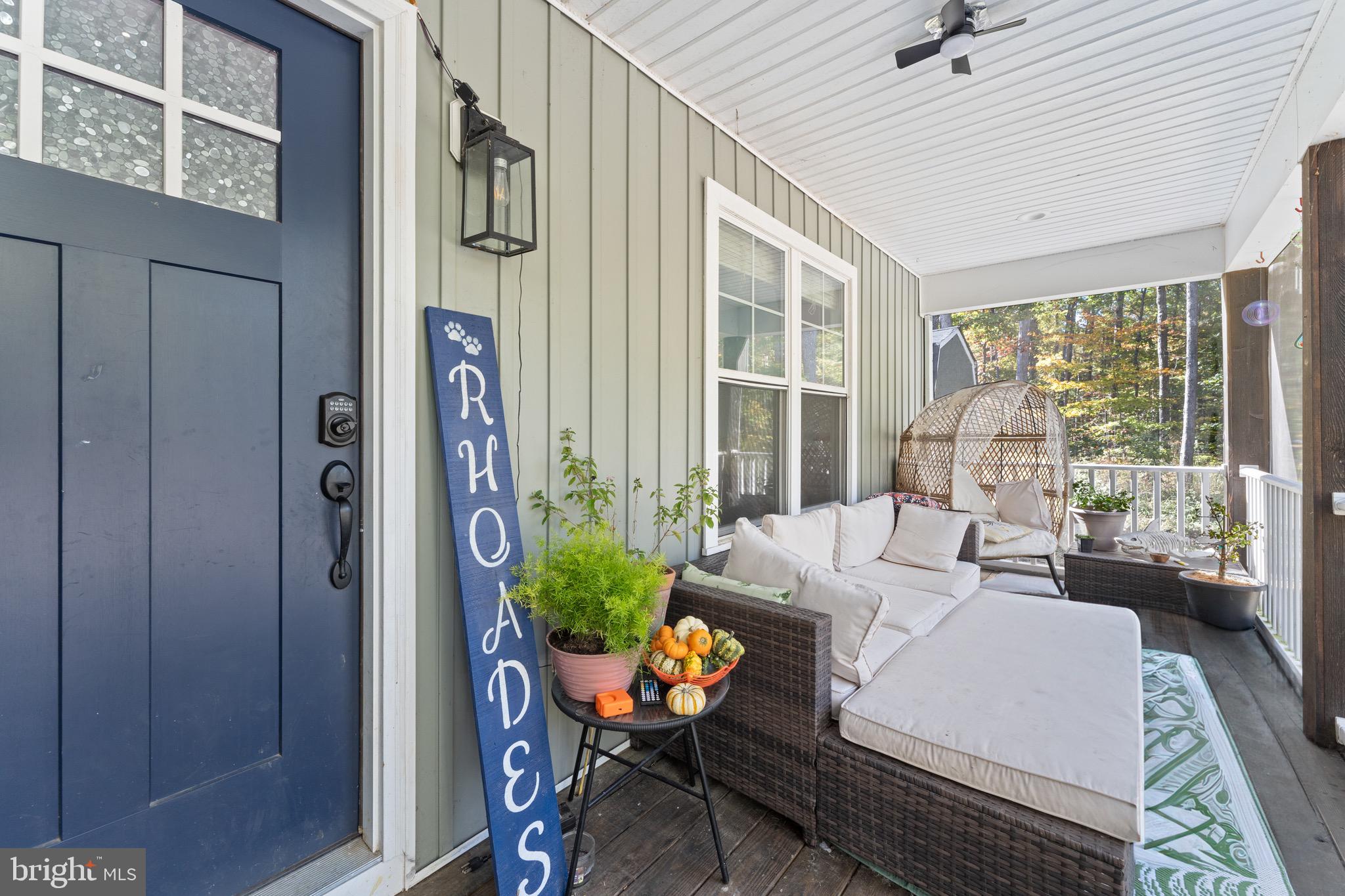 1322 Kennon Road Mineral, VA 23117 - Photo 3 of 27 a outdoor space with patio the couches and a dining table with garden view