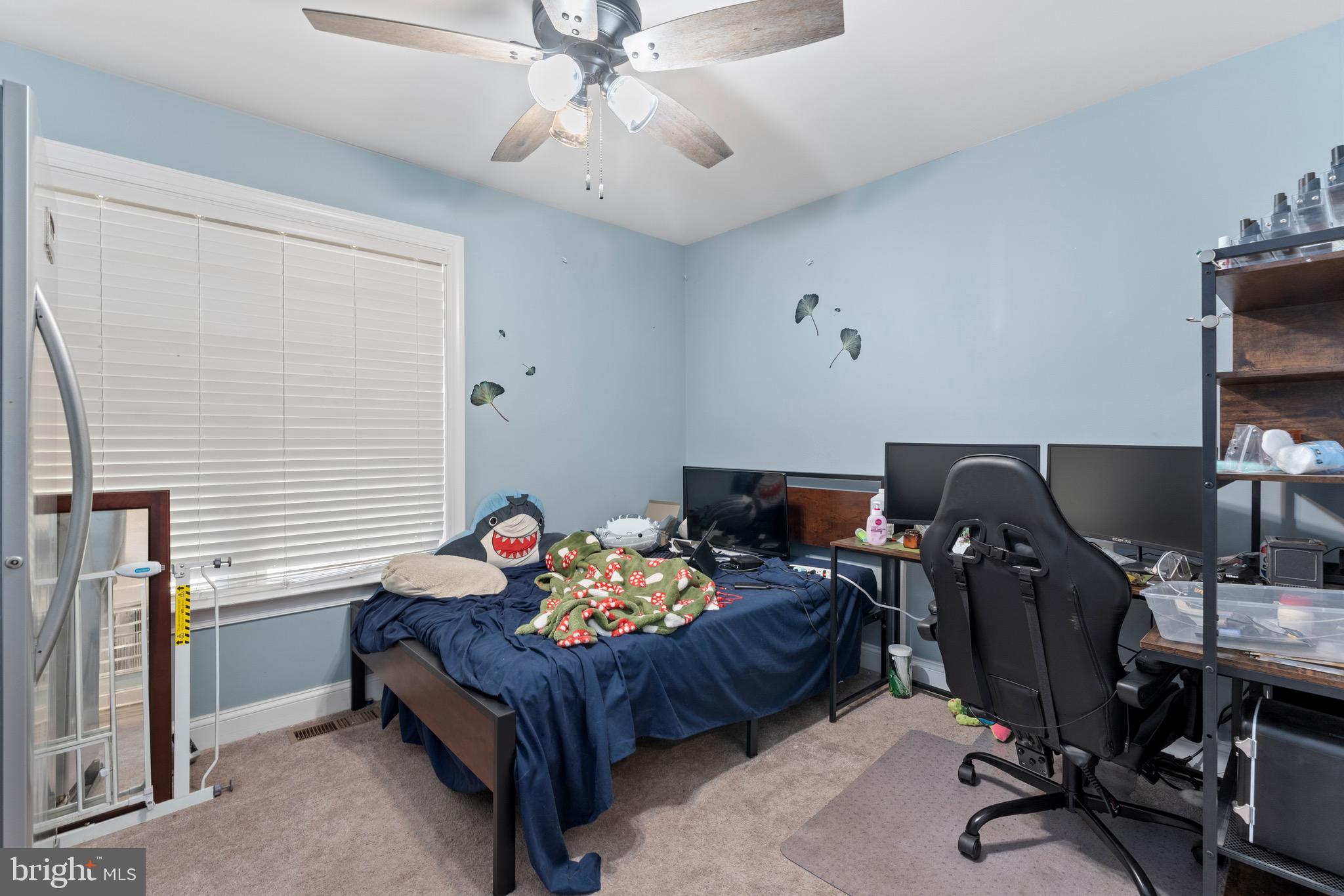 1322 Kennon Road Mineral, VA 23117 - Photo 10 of 27 a living room with furniture and a flat screen tv