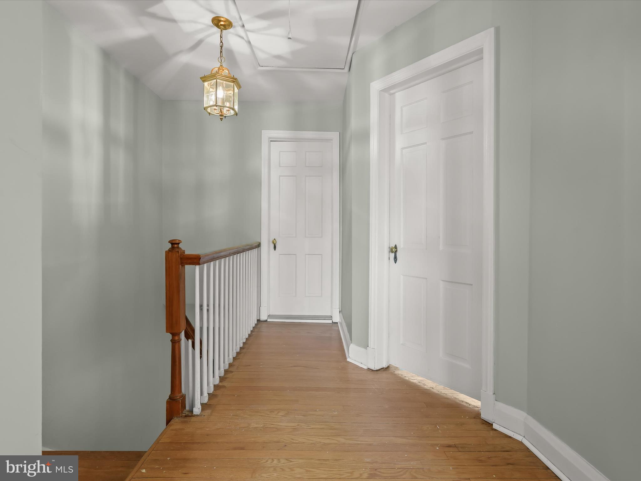 415 Whitfield Road Catonsville, MD 21228 - Photo 18 of 43 a view of a hallway with wooden floor and staircase
