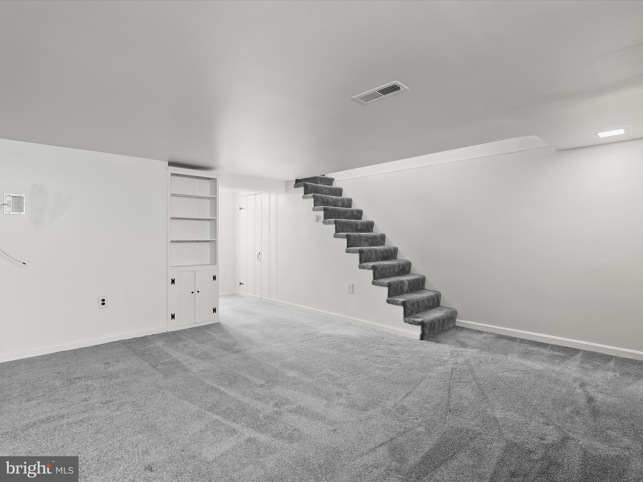 415 Whitfield Road Catonsville, MD 21228 - Photo 28 of 43 a view of an empty room with stairs