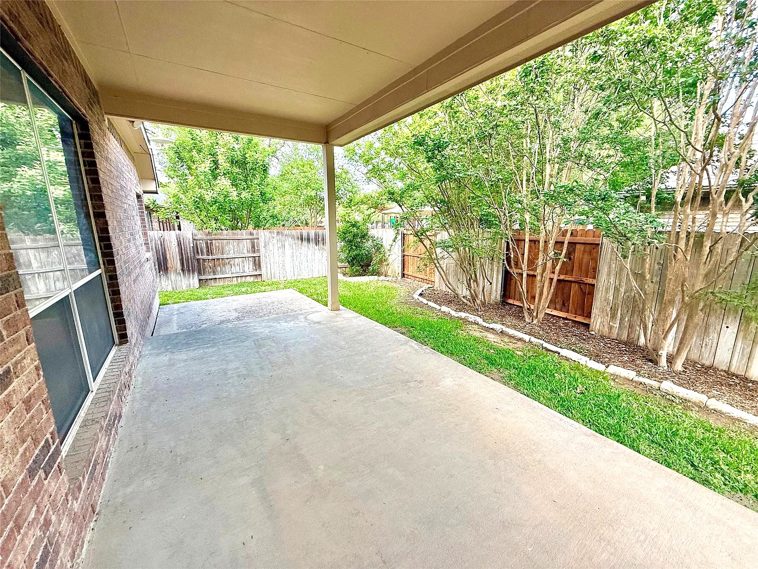 608 Pebblestone Walk Drive Cedar Park, TX 78613 - Photo 13 of 27 Fenced backyard featuring a patio area