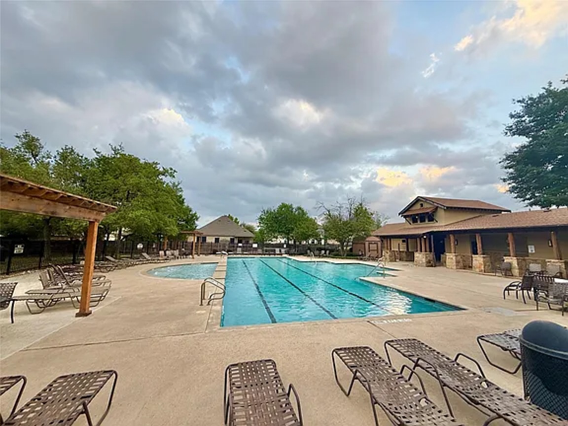 608 Pebblestone Walk Drive Cedar Park, TX 78613 - Photo 26 of 27 Community pool with a patio