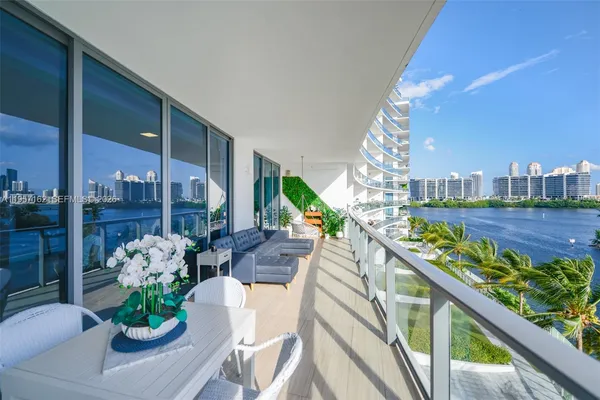 a view of a lake with a balcony