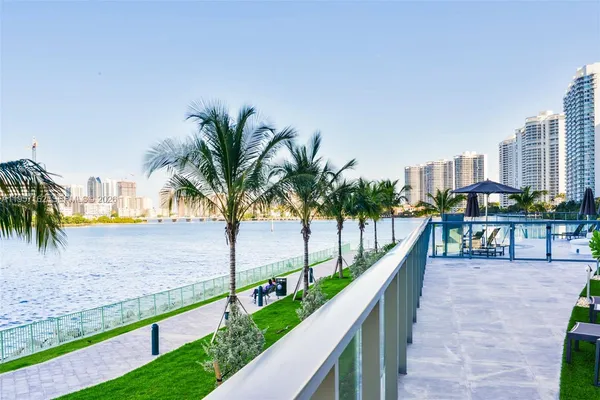a view of building with outdoor space and seating area