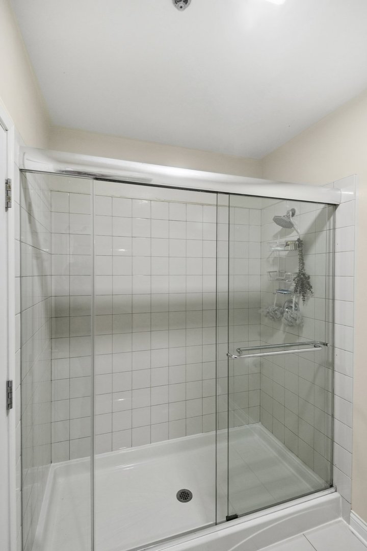 8 West Monroe Street, Unit 1209 Chicago, IL 60603 - Photo 13 of 24 a bathroom with a shower