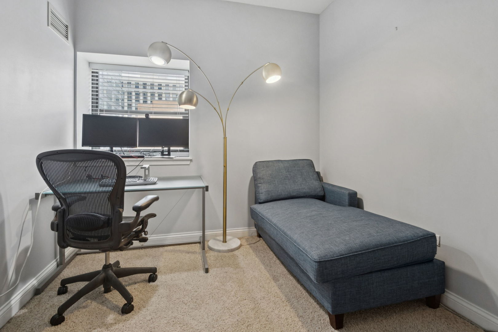 8 West Monroe Street, Unit 1209 Chicago, IL 60603 - Photo 14 of 24 a workspace with furniture and a window