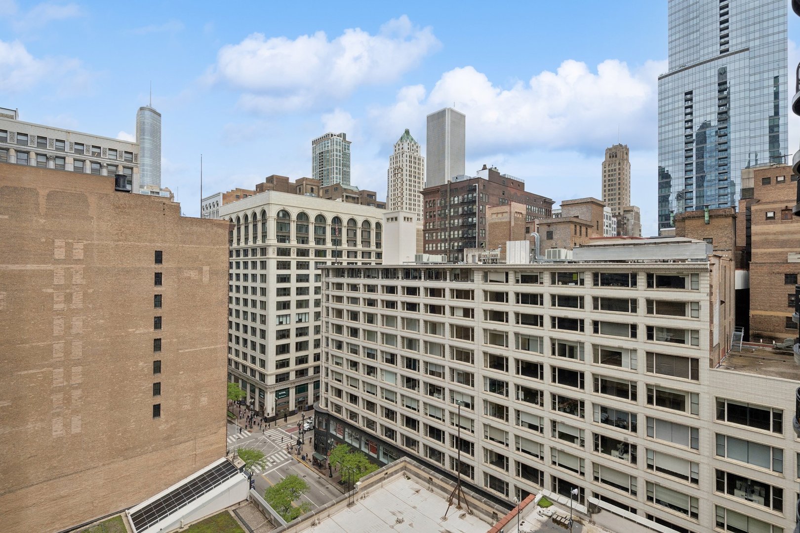 8 West Monroe Street, Unit 1209 Chicago, IL 60603 - Photo 19 of 24 a view of a city with tall buildings