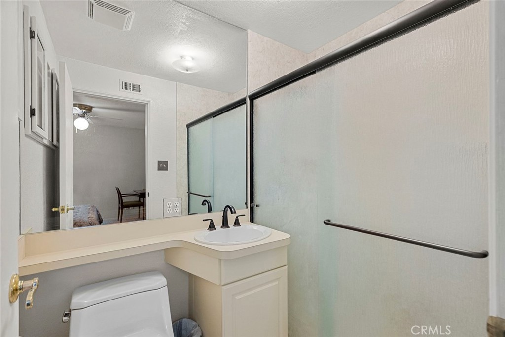 4790 Adam Road Simi Valley, CA 93063 - Photo 20 of 61 a bathroom with a sink and a mirror