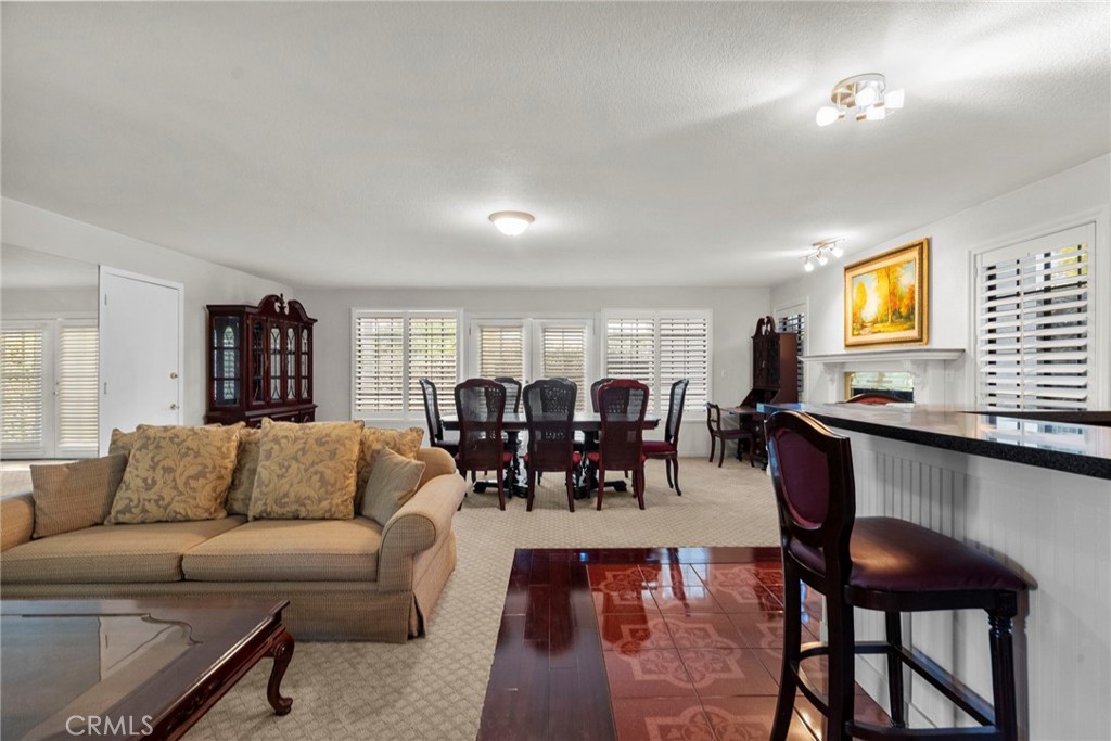 4790 Adam Road Simi Valley, CA 93063 - Photo 26 of 61 a living room with furniture and floor to ceiling window