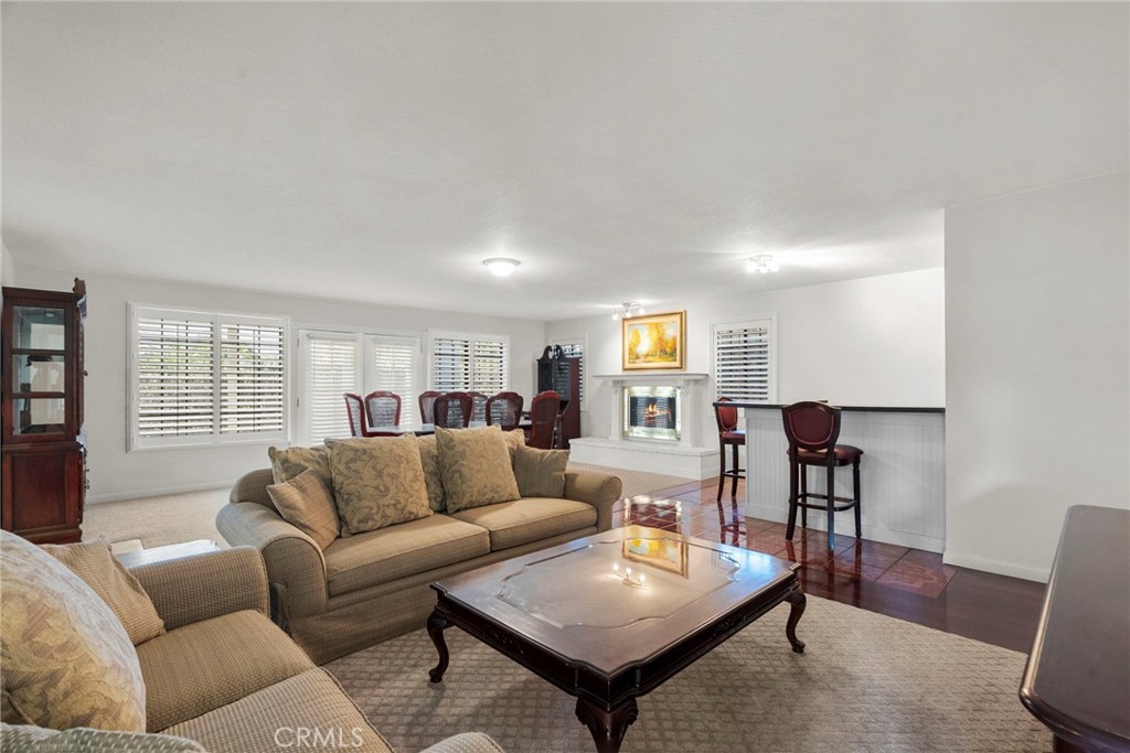 4790 Adam Road Simi Valley, CA 93063 - Photo 28 of 61 a living room with furniture wooden floor and a window
