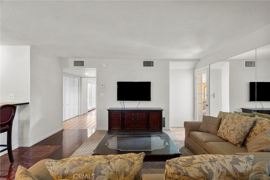 4790 Adam Road Simi Valley, CA 93063 - Photo 31 of 61 a living room with furniture and a flat screen tv