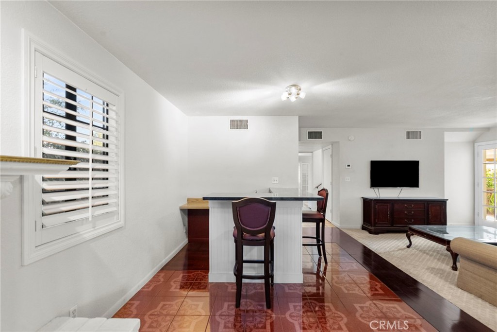4790 Adam Road Simi Valley, CA 93063 - Photo 36 of 61 a view of a livingroom with furniture and a flat screen tv