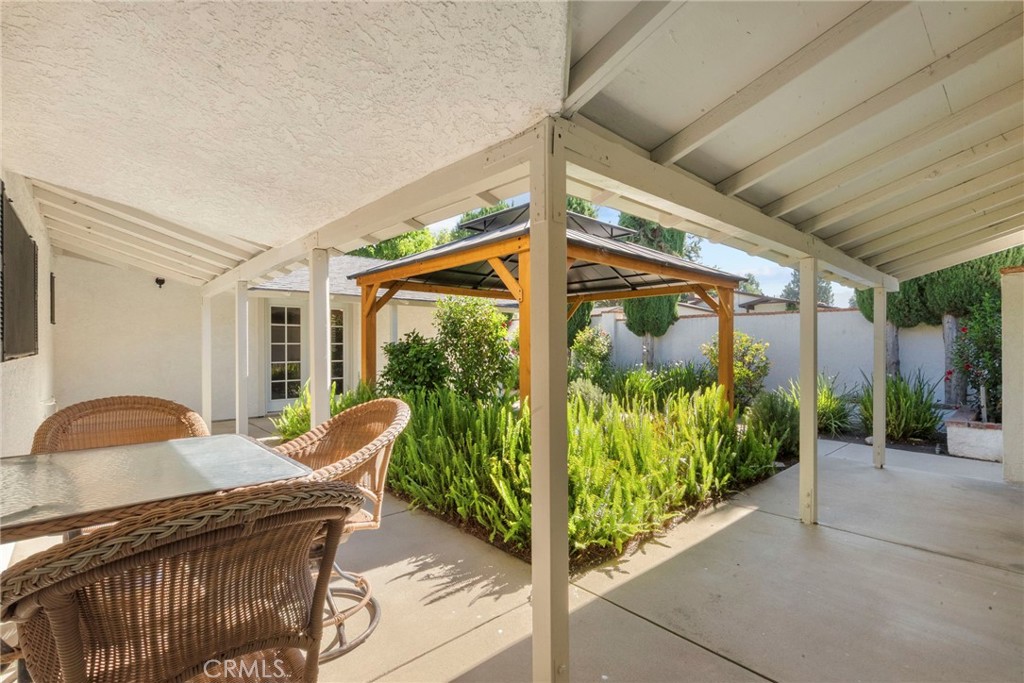 4790 Adam Road Simi Valley, CA 93063 - Photo 37 of 61 a balcony with furniture and garden view