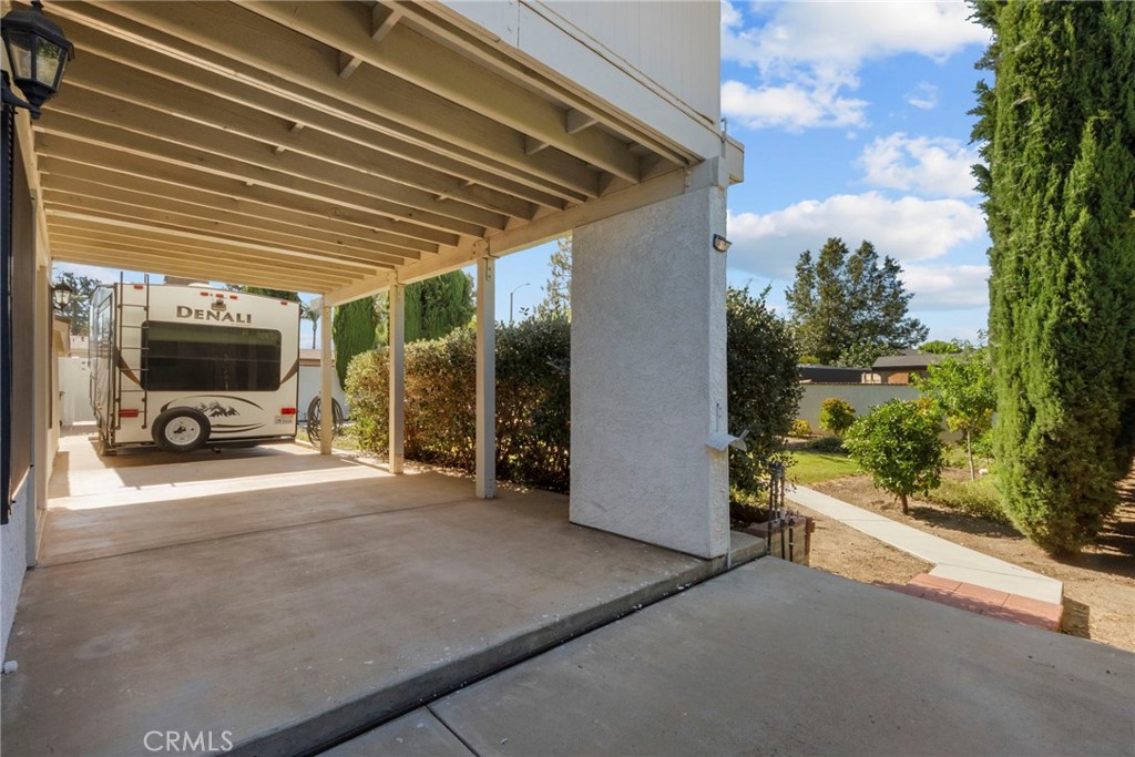 4790 Adam Road Simi Valley, CA 93063 - Photo 42 of 61 a view of a porch with furniture and a garage