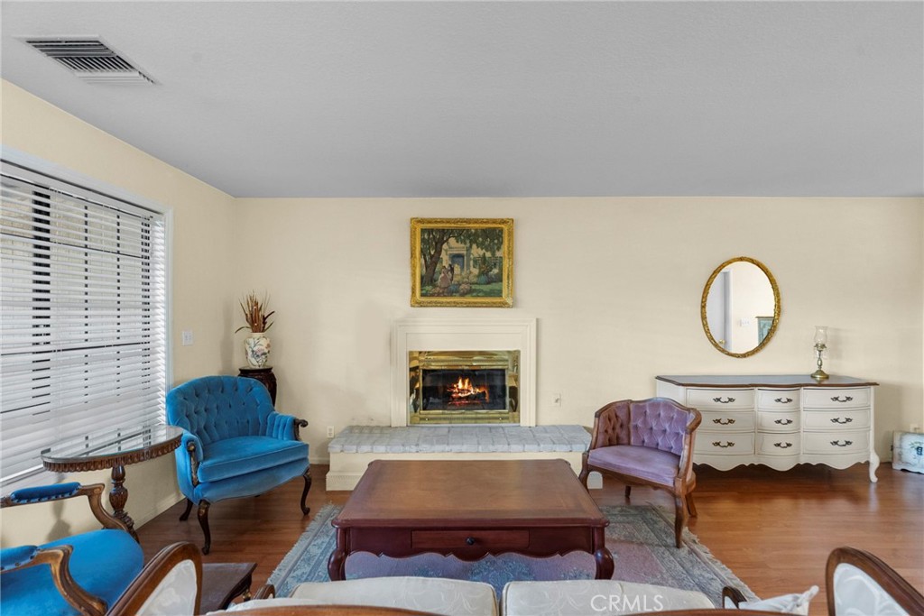 4790 Adam Road Simi Valley, CA 93063 - Photo 51 of 61 a living room with furniture and a fireplace