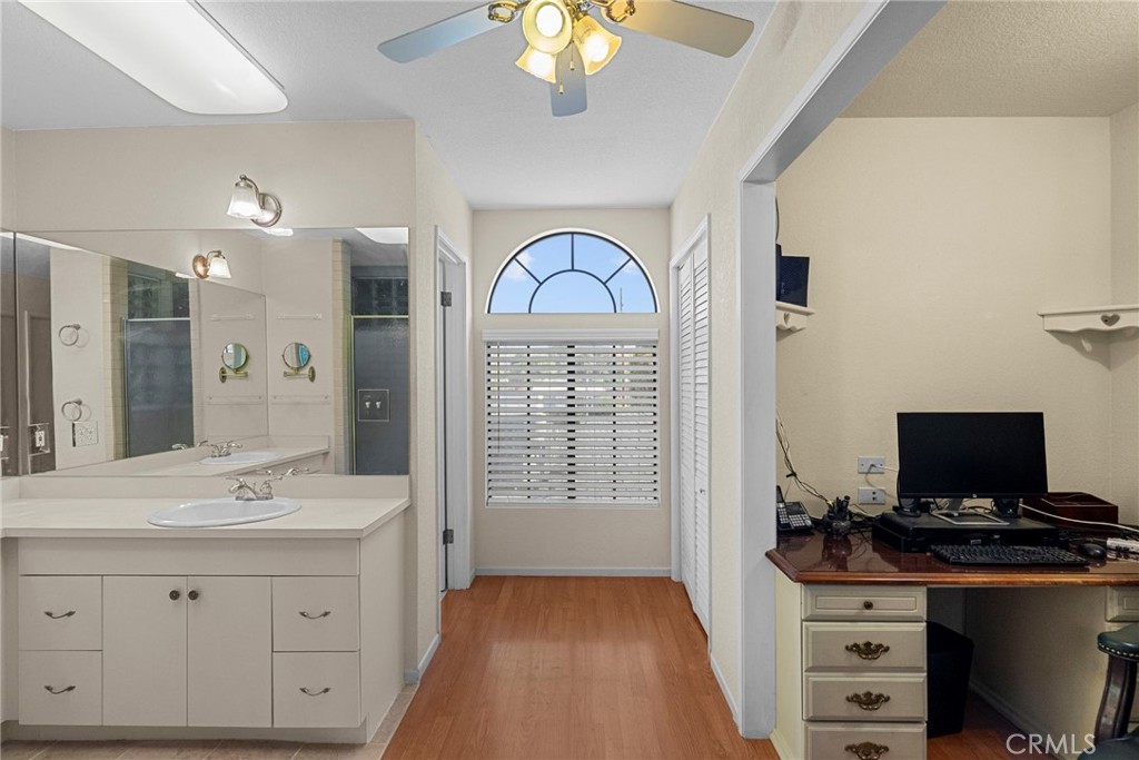4790 Adam Road Simi Valley, CA 93063 - Photo 53 of 61 a bathroom with a sink a large mirror and a shower