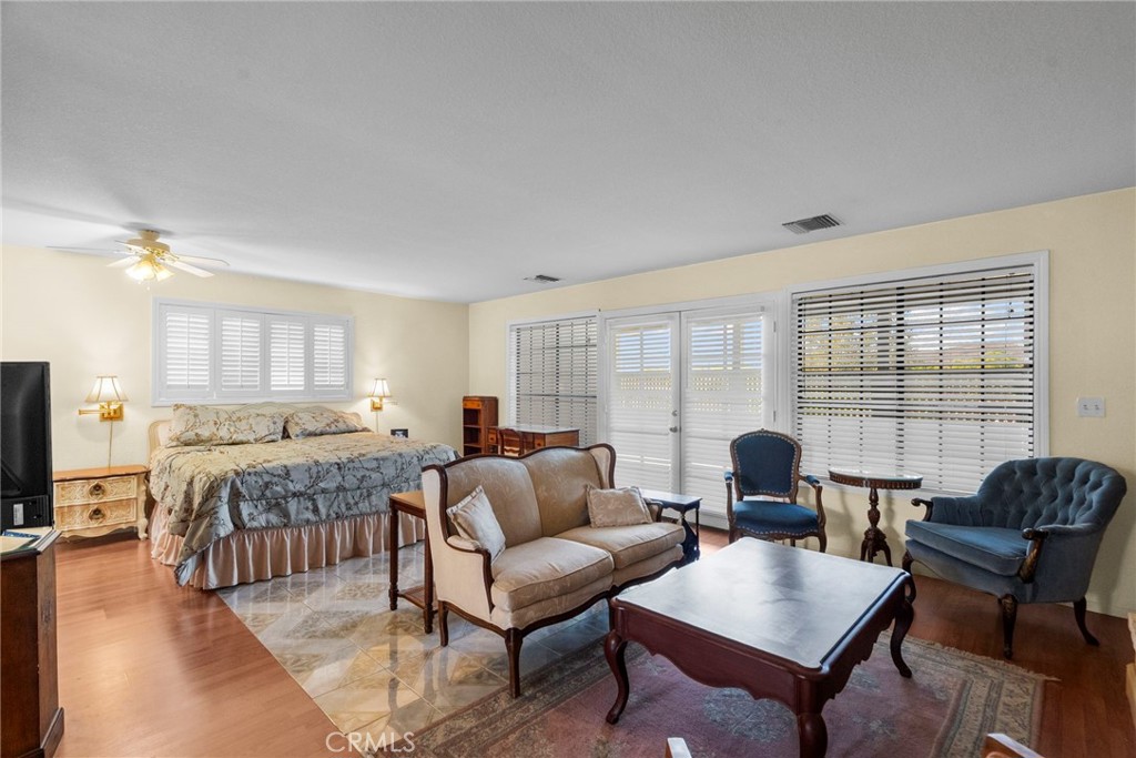 4790 Adam Road Simi Valley, CA 93063 - Photo 57 of 61 a living room with furniture and a flat screen tv